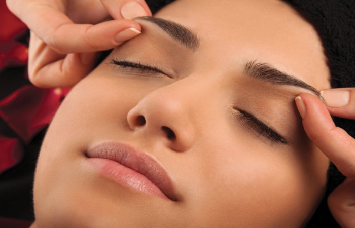 Massage your brows every night to stimulate hair growth